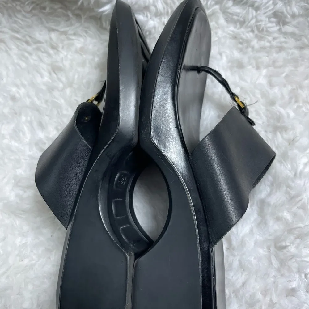Nine West Cloud black leather thong sandals with gold tone accents size 8.5